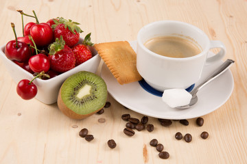 Cup of coffee, cake and fruits for healthy breakfast