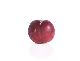 Plums close up isolated on white background