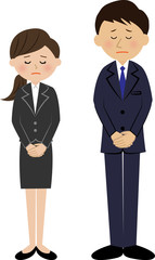 お詫びする会社員　男女