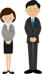 お詫びする会社員　男女