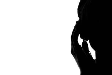 silhouette of a woman with headphones