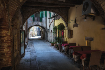 Fototapeta premium Tuscan restaurant in the corners of the medieval town of Montepu