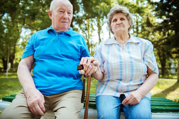 Elderly couple relaxing in the park,