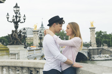 Fototapeta premium Young couple dating in Paris