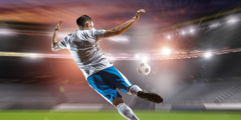 Soccer player hitting ball
