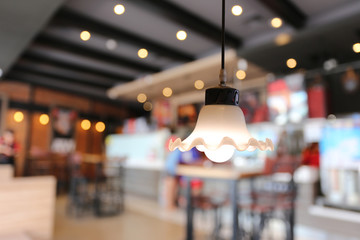 Warm lighting modern ceiling lamps in the cafe.