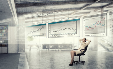 Fototapeta premium Businesswoman having rest in office