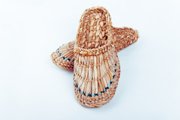 Fototapeta premium Wicker sandals with ornament