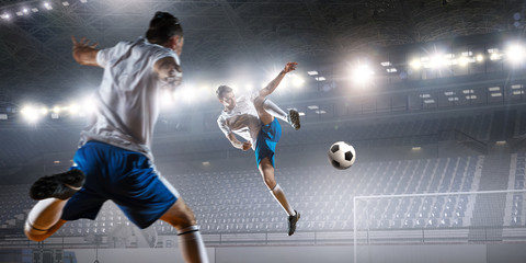 Soccer player hitting ball