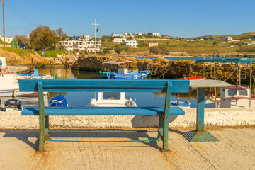 Fototapeta premium Traditional fishing boats in Cyclades, Greece. Bright sunlight r