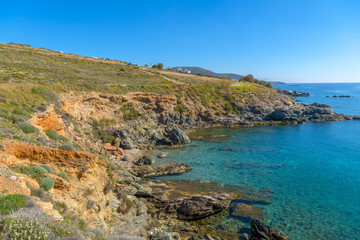 Fototapeta premium Rocky beach in Mykonos, Cyclades, Greece.