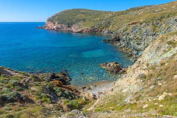 Fototapeta premium Rocky beach in Mykonos, Cyclades, Greece.