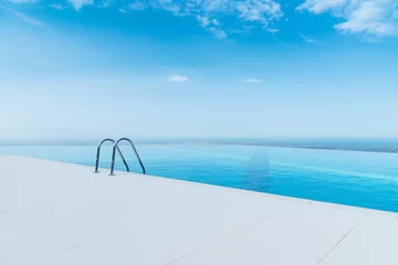 Foto op Canvas Infinity pool on the bright summer day © Elnur