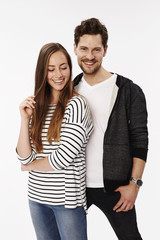 Loving couple embracing in studio