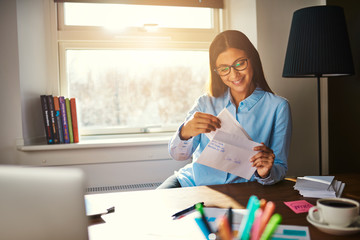 Business woman getting ready to mail a letter