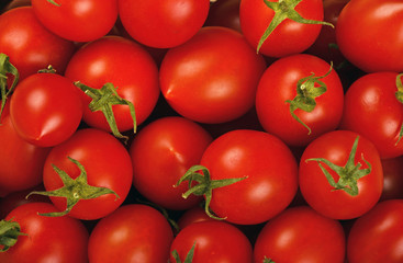 Red cherry tomatoes background