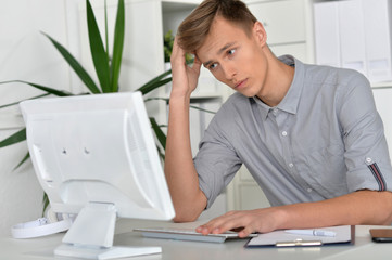 young businessman with computer