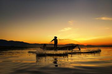Fisherman Lake in action when fishing, Thailand