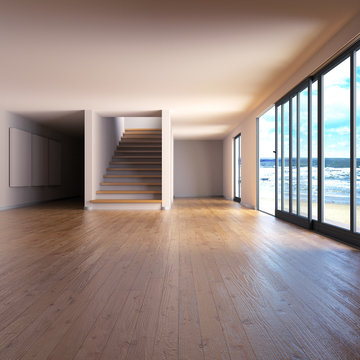 Raum mit Holzfußboden und Treppe an der See