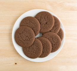 Plate of Dutch cocoa cookies on a wood table top