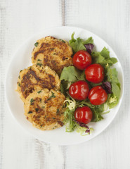 Couscous patties with vegetable salad