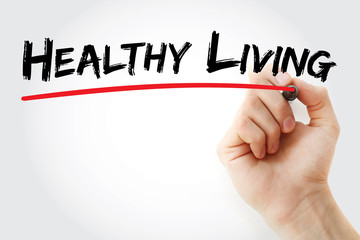 Hand writing Healthy living with marker, health concept
