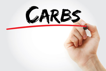 Hand writing Carbs with marker, health concept