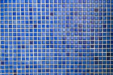 old blue ceramic wall tiles background