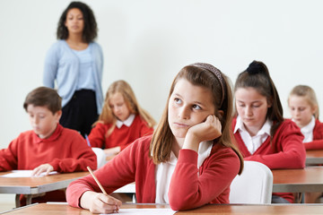 Female Pupil Finding School Exam Difficult