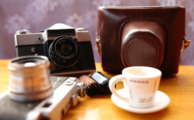 Vintage camera on wooden table