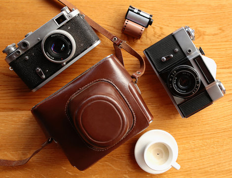 Vintage camera on wooden table