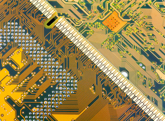 Yellow circuit board close-up photo.
