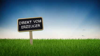 Sign with direct from the source text in grass