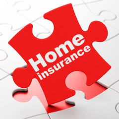 Insurance concept: Home Insurance on puzzle background