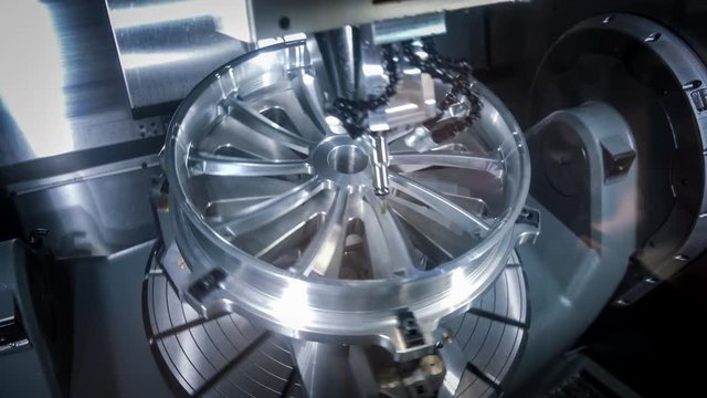 Metalworking CNC milling machine. Cutting metal modern processing technology.