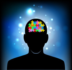 Puzzle brain and silhouette head