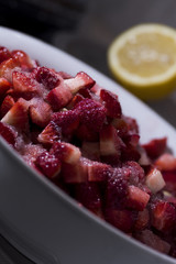strawberries cut into pieces and served with strawberries