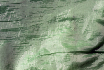 Abstract green fabric texture.