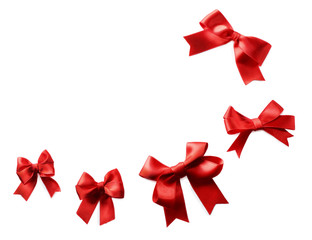 Red ribbon bows on a white background