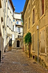 Fototapeta na wymiar Traditional old street in the historic center of Avignon, Provence, France
