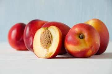 Fototapeta na wymiar group of peaches wooden background