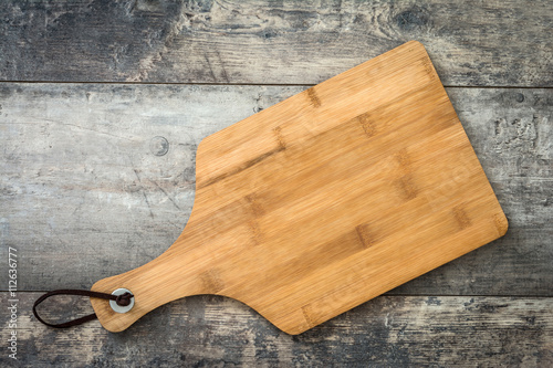 "Cutting board on a wooden background " Stock photo and royalty-free