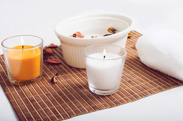 Spa still life with two candles and a towel