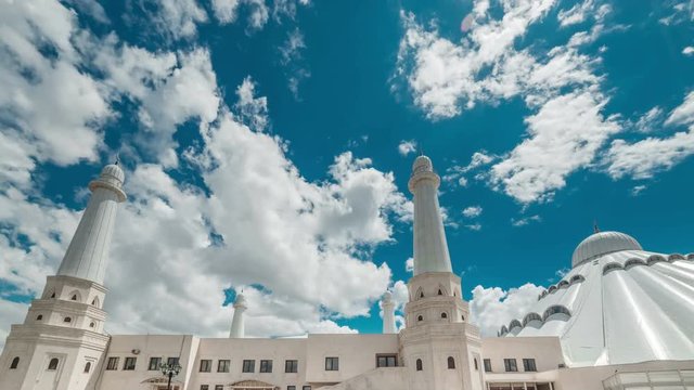 Beautiful clouds over the white mosque. Kazakhstan - 4K Timelapse