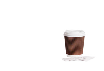 Disposable cup of coffee in hand