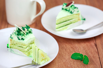 Pandan cake on wood table. selective focus