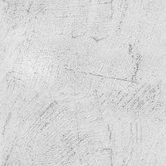 Gray concrete wall with stucco relief pattern