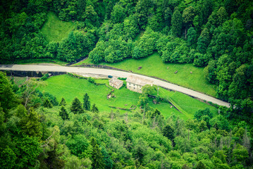 Fototapeta na wymiar mountain road from above - outdoor activity in italy