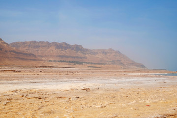 Fototapeta premium Desert landscape with mountains on horizon