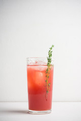 Cocktail made of Sicilian orange on the rustic wooden background